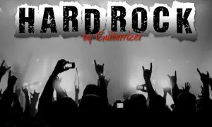 Tłum fanów z rękami w górze, pozdrawiający ulubione hard rock zespoły. W tle napis "HARD ROCK".